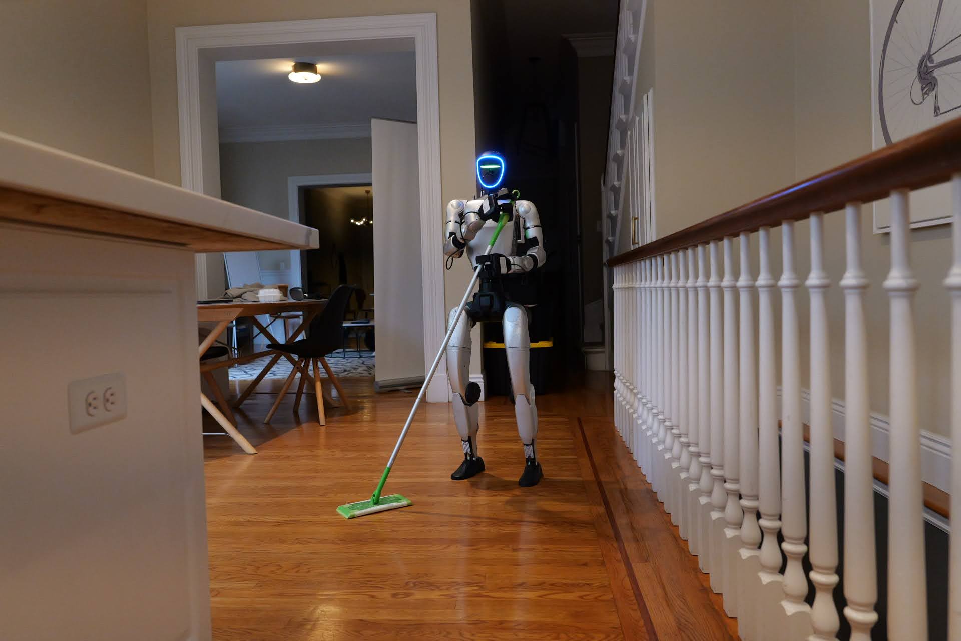 Gatsby robot mopping a hardwood hallway